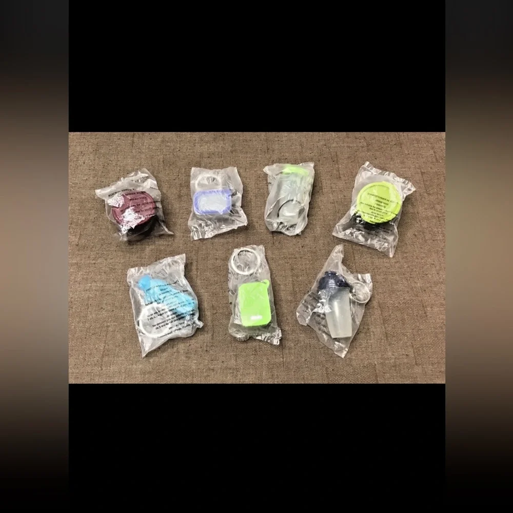 New Tupperware Lot of 7 (6 Keychains & 1 Magnet) No Duplicates - Collectible